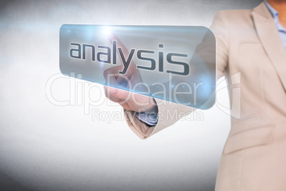 Businesswoman pointing to word analysis