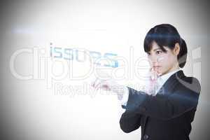 Businesswoman pointing to word issues