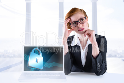 Composite image of thinking redhead businesswoman