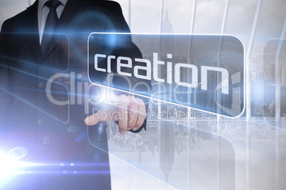 Businessman presenting the word creation