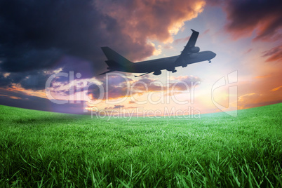 Composite image of airplane taking off