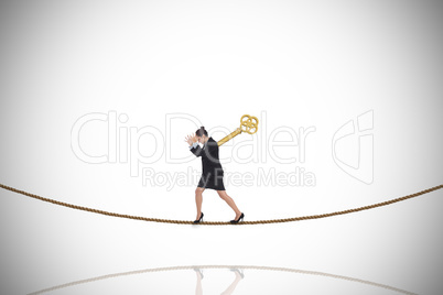 Composite image of wound up businesswoman gesturing on tightrope