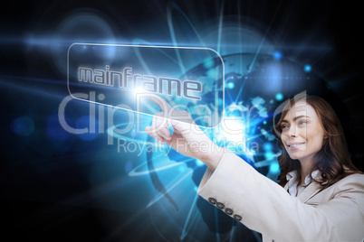 Businesswoman pointing to word mainframe