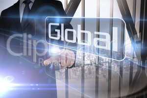 Businessman presenting the word global