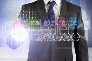 Businessman touching the words optimal assurance on interface