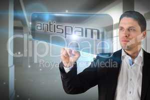 Businessman pointing to word antispam