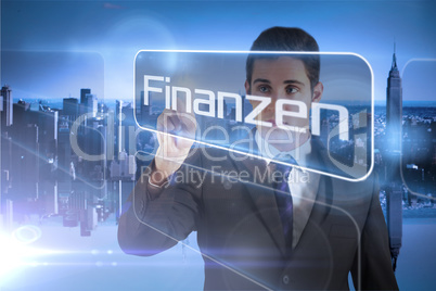 Businessman presenting the word finance in german