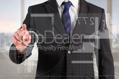 Composite image of businessman in suit pointing finger to interf