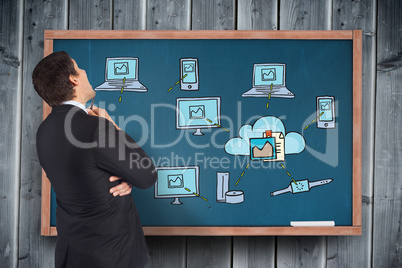 Composite image of thinking businessman