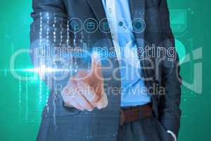 Businessman touching the words digital marketing on interface