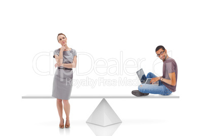 White scales measuring businesswoman and man