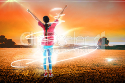 Composite image of cheering football fan