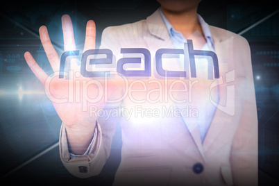 Businesswoman presenting the word reach