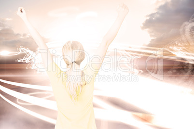 Composite image of excited football fan in brasil tshirt