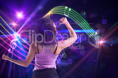 Composite image of pretty girl singing