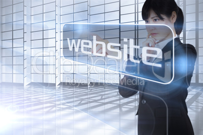 Businesswoman looking at the word website