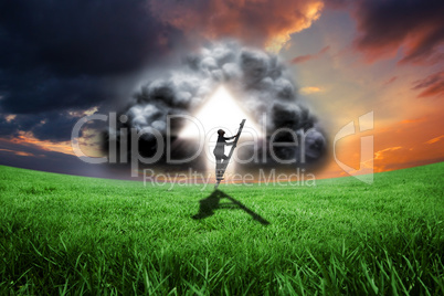 Composite image of businessman climbing up ladder