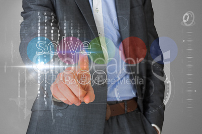 Businessman touching the word solve on interface