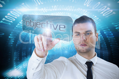 Businessman pointing to word objective