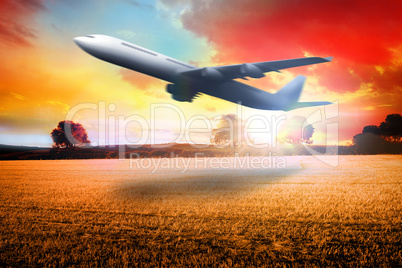 Composite image of airplane taking off