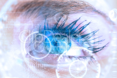 Composite image of close up of female blue eye