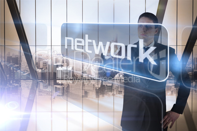 Businessman presenting the word network