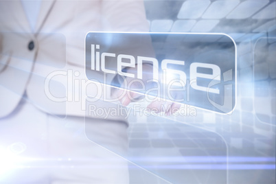 Businesswoman pointing to word license