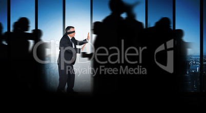 Composite image of silhouette of business people walking