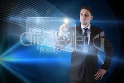 Businessman pointing to word network