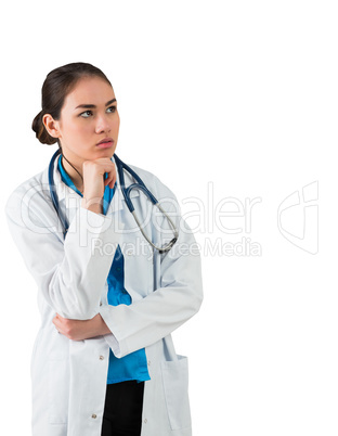 Serious doctor in lab coat thinking with hand on chin Serious doctor in lab coat thinking with hand on chin