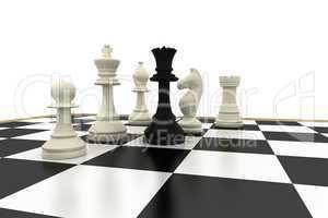 Black queen standing with white chess pieces