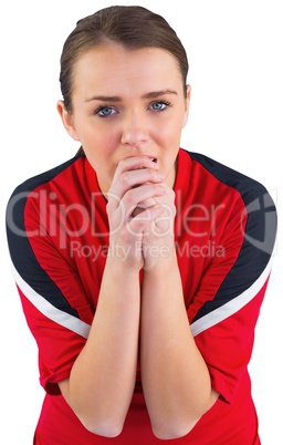 Nervous football fan in red