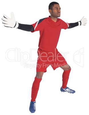 Goalkeeper in red ready to save