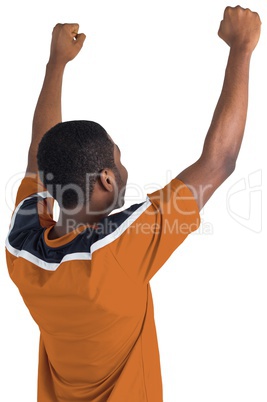 Cheering football fan in orange jersey