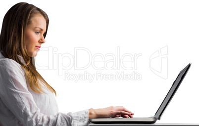 Businesswoman typing on her laptop