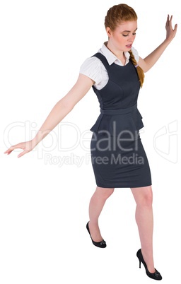 Businesswoman doing a balancing act