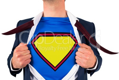 Businessman opening shirt in superhero style Businessman opening shirt in superhero style