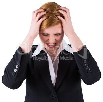 Stressed businesswoman with hands on her head Stressed businesswoman with hands on her head