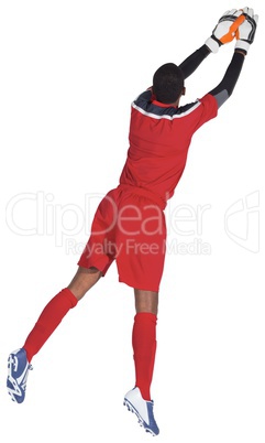 Goalkeeper in red making a save