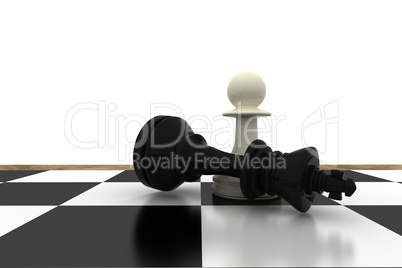 White pawn standing over fallen black king