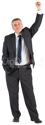 Mature businessman cheering with arm up