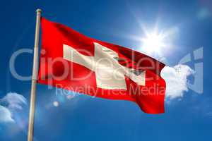 Swiss national flag on flagpole