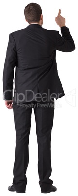 Businessman in suit pointing finger