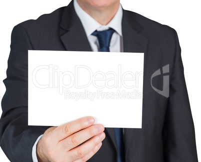 Mature businessman showing blank card