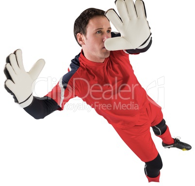 Fit goal keeper jumping up