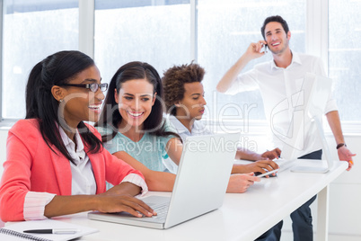 Casual business people working at desk