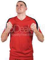 Excited football player cheering