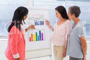 Attractive businesswoman making a presentation at work