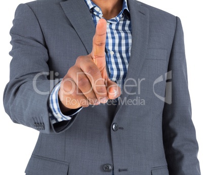 Focused businessman pointing