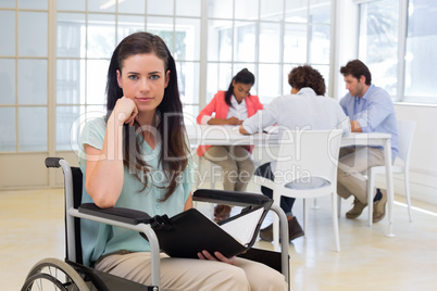 Attractive disabled businesswoman at work